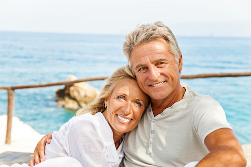 Older couple safely enjoying the summer sun in Florida
